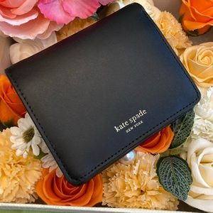 Authentic kate spade New York  bifold wallet.